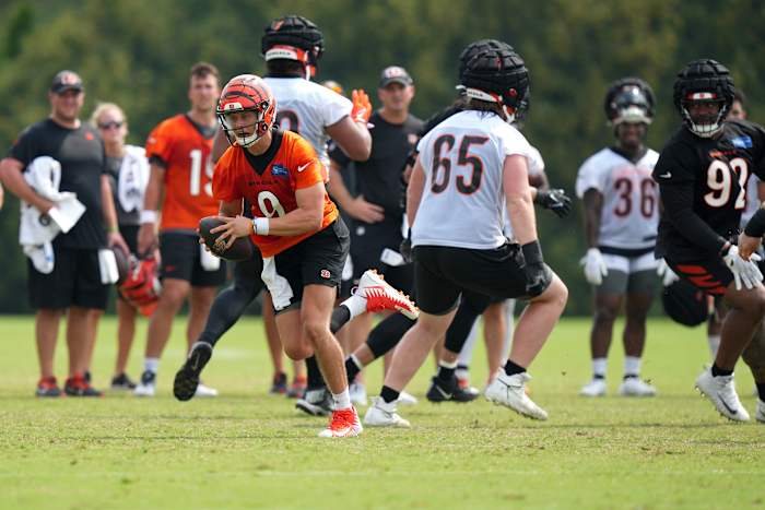July 27, 2023; Cincinnati, OH, USA; Cincinnati Bengals quarterback Joe Burrow (9) suffers an injury on this scramble play during Cincinnati Bengals training camp practice, Thursday, July 27, 2023, at the practice fields next to Paycor Stadium in Cincinnati. Mandatory Credit: Kareem Elgazzar-USA TODAY NETWORK